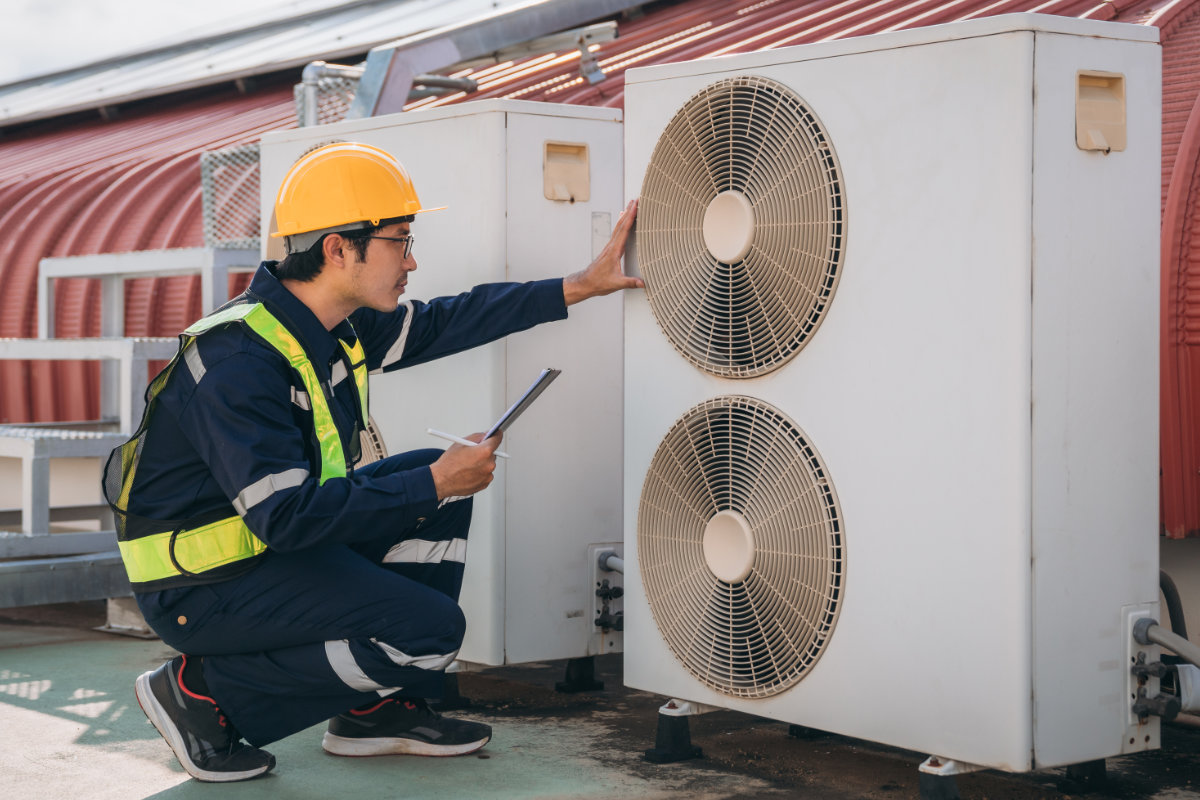 Engineers is checking the air conditioning cooling system of a major building or industrial facility.